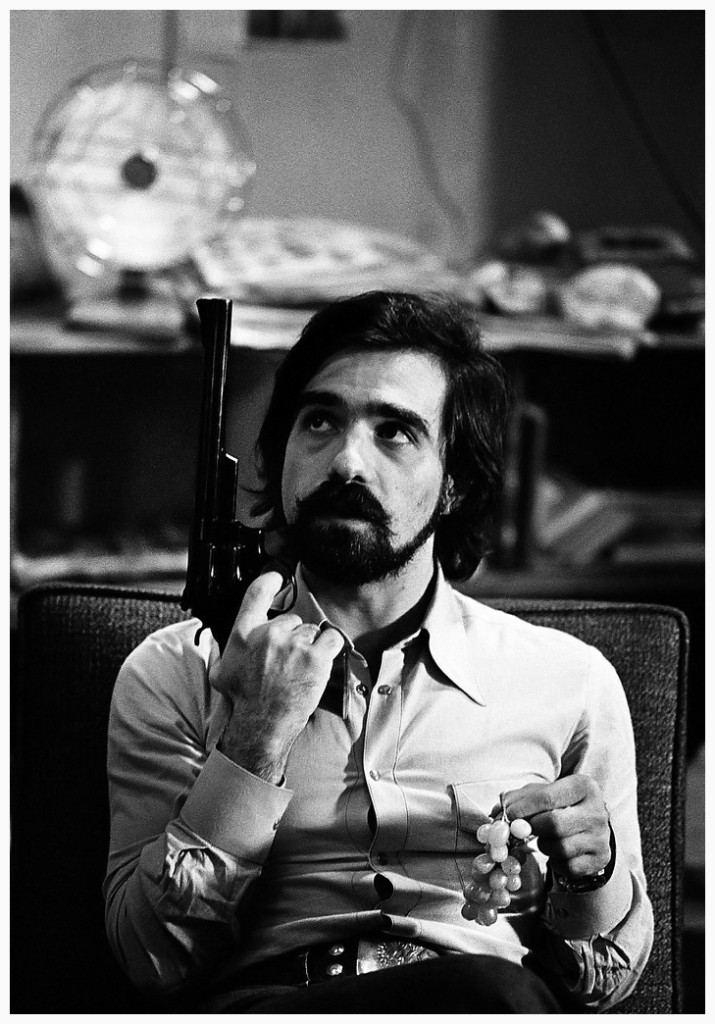 martin-scorsese-with-one-of-the-guns-used-by-robert-de-niro-on-the-set-of-taxi-driver-photo-steve-shapiro-1976